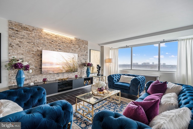 living area with a city view and wood finished floors