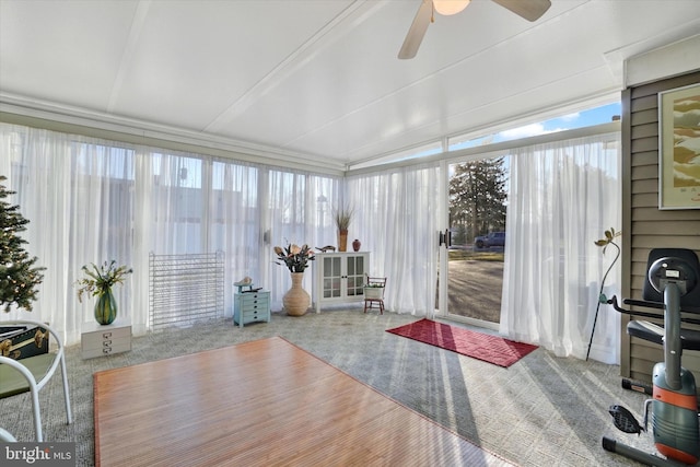 sunroom with a ceiling fan