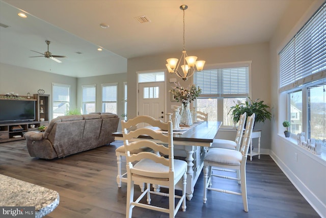 dining space featuring dark wood-style floors, visible vents, recessed lighting, and baseboards