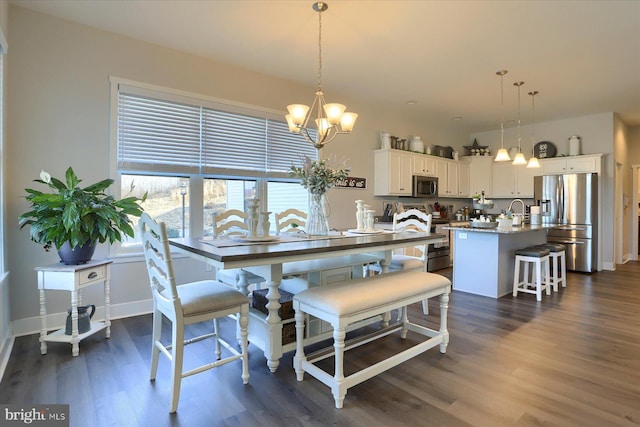 dining room featuring baseboards, an inviting chandelier, and dark wood finished floors