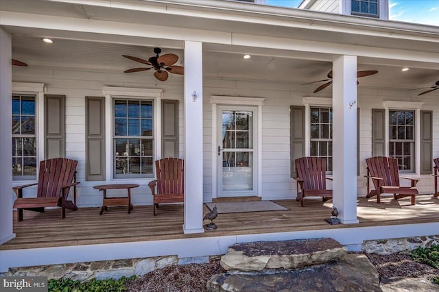 exterior space featuring a ceiling fan and covered porch