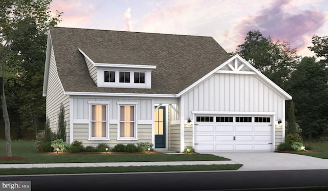 view of front of house featuring a garage, roof with shingles, board and batten siding, and concrete driveway