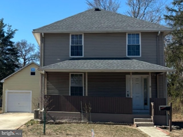 view of front facade with covered porch, concrete driveway, a shingled roof, and a garage