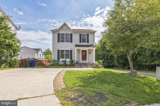 view of front facade featuring a front yard