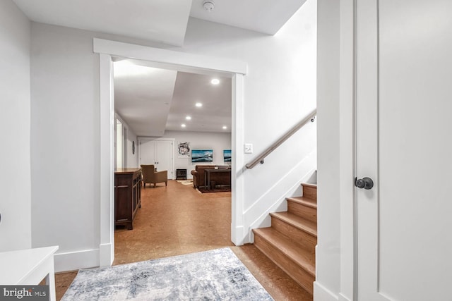 interior space featuring recessed lighting and baseboards