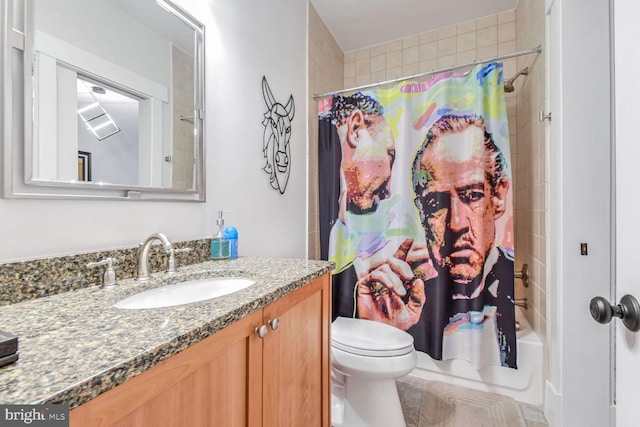 bathroom with shower / tub combo, toilet, and vanity