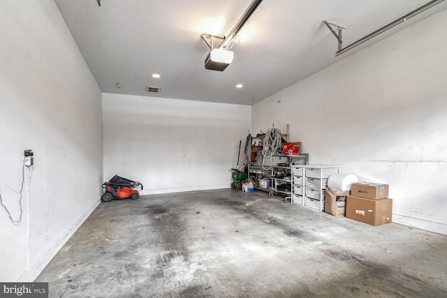 garage featuring a garage door opener