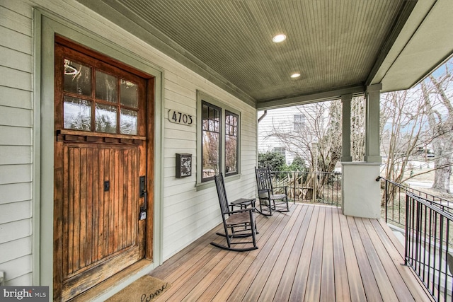 wooden deck with a porch