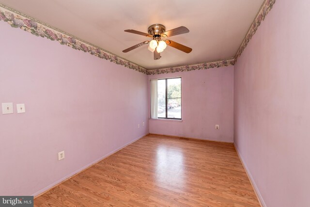 24 W Orange Ct, Baltimore, MD 21234 - spare room featuring light wood finished floors, ceiling fan, and baseboards