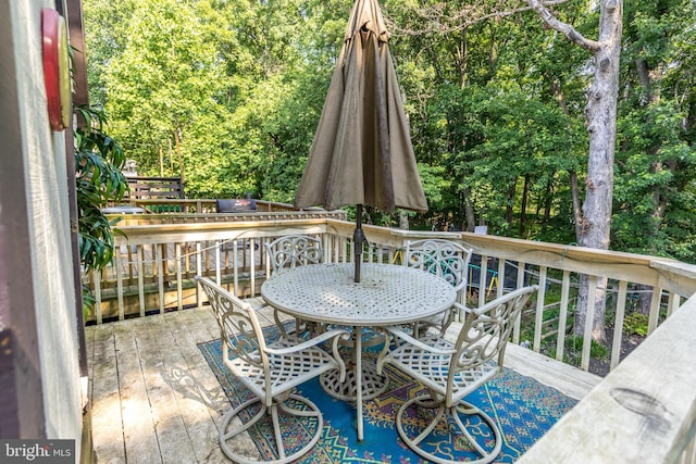 24 W Orange Ct, Baltimore, MD 21234 - wooden terrace with outdoor dining space