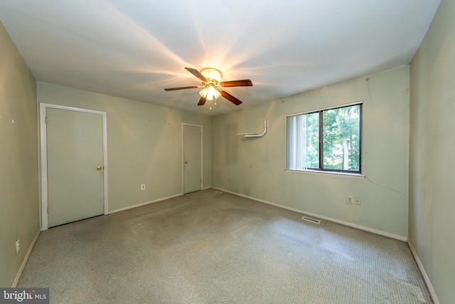 24 W Orange Ct, Baltimore, MD 21234 - carpeted spare room with ceiling fan and baseboards