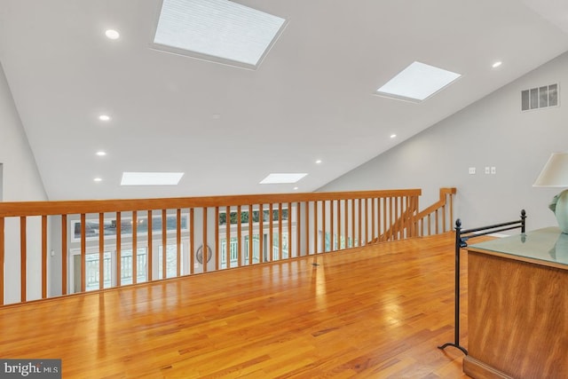 99 N Lakeshore, Manahawkin, NJ 08050 - hall featuring recessed lighting, visible vents, lofted ceiling with skylight, and wood finished floors