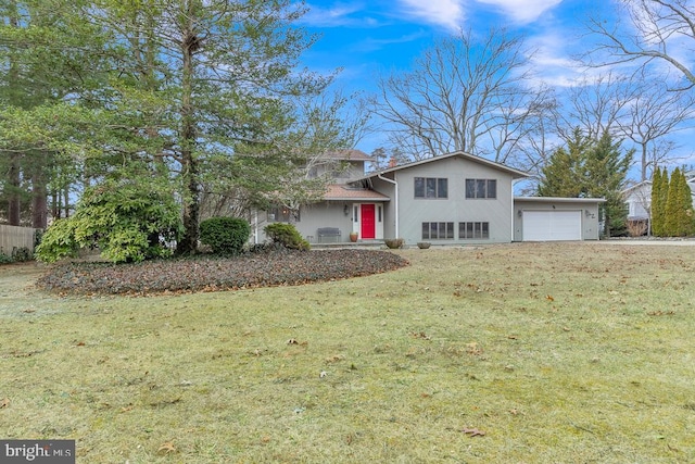 99 N Lakeshore, Manahawkin, NJ 08050 - tri-level home featuring an attached garage and a front yard