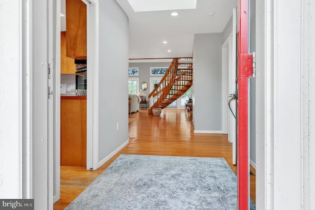 99 N Lakeshore, Manahawkin, NJ 08050 - entrance foyer with stairway, recessed lighting, a skylight, and wood finished floors