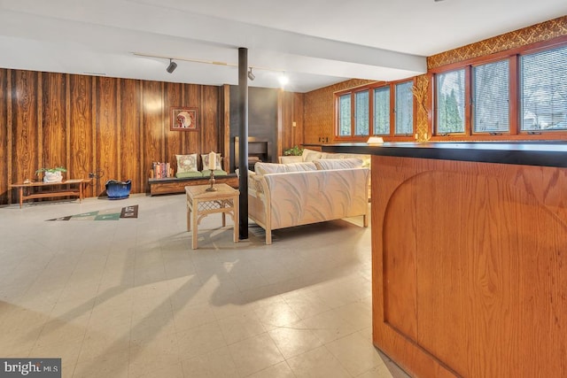 99 N Lakeshore, Manahawkin, NJ 08050 - interior space with tile patterned floors, wood walls, and track lighting