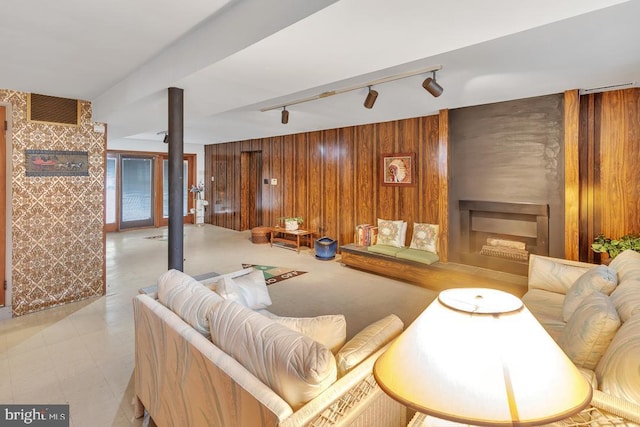 99 N Lakeshore, Manahawkin, NJ 08050 - living area with track lighting, wood walls, a large fireplace, and visible vents