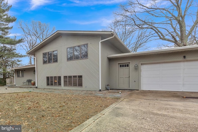 99 N Lakeshore, Manahawkin, NJ 08050 - view of front of home with concrete driveway and a garage