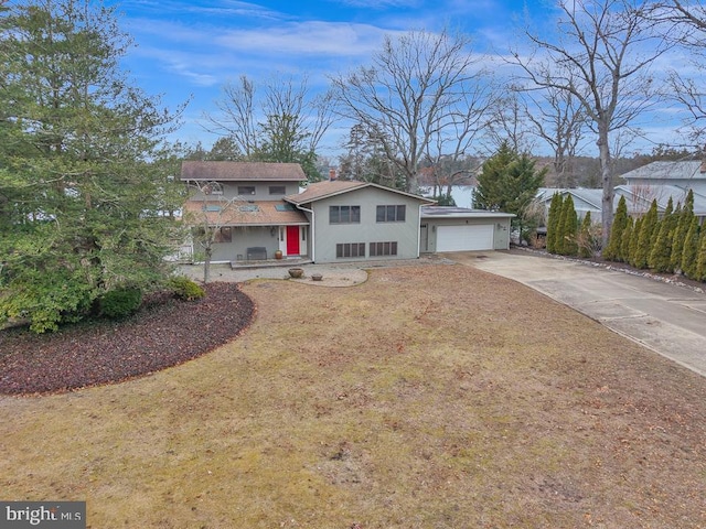 99 N Lakeshore, Manahawkin, NJ 08050 - view of front facade with stucco siding, a front lawn, driveway, a garage, and a chimney