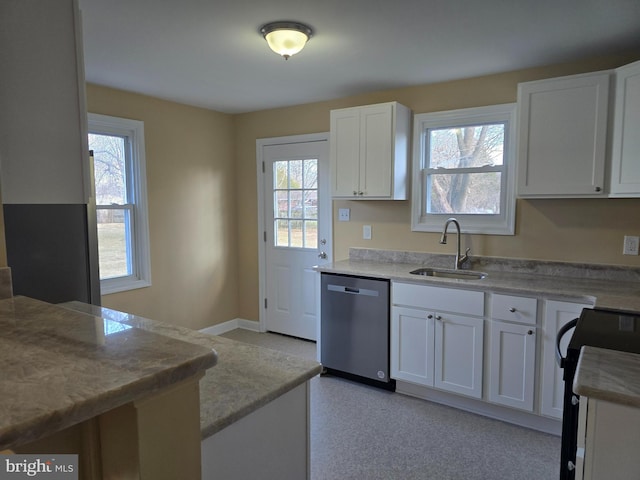 kitchen with a sink, light countertops, white cabinets, black range with electric stovetop, and dishwasher