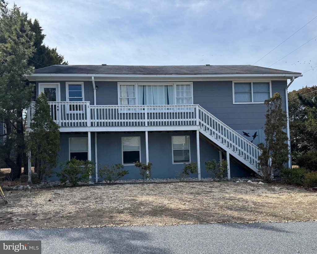 view of front of home with stairway