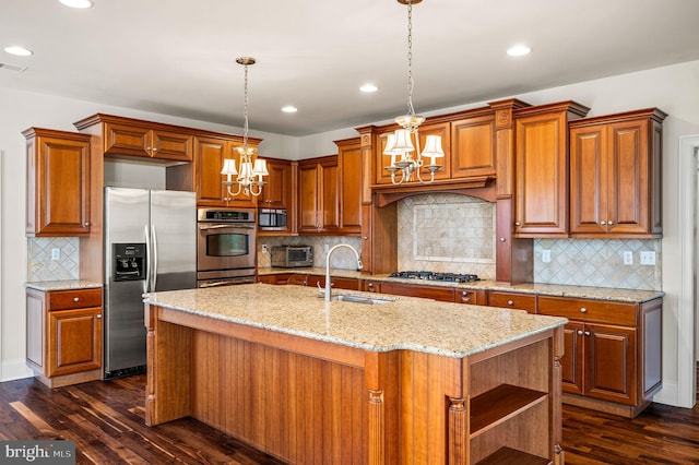 kitchen featuring a sink, open shelves, light stone countertops, stainless steel appliances, and dark wood-style flooring