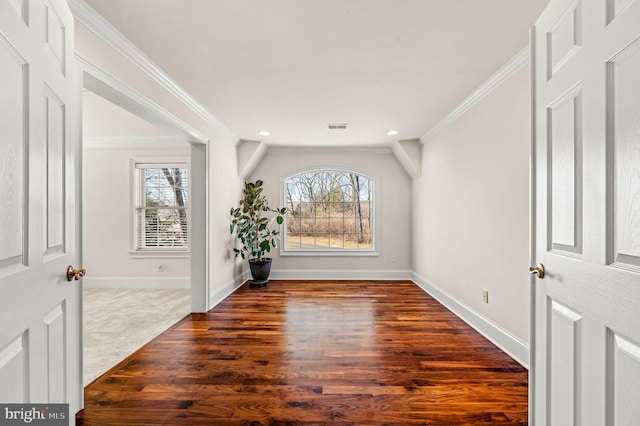 entryway with dark wood-style floors, recessed lighting, baseboards, and ornamental molding