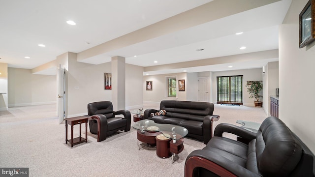 living room featuring light carpet, recessed lighting, and baseboards