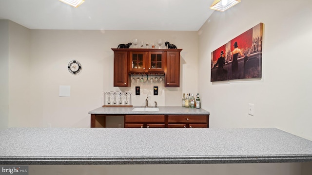 bar with a sink and wet bar