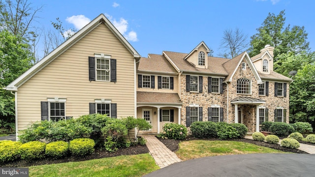 view of front of house featuring stone siding