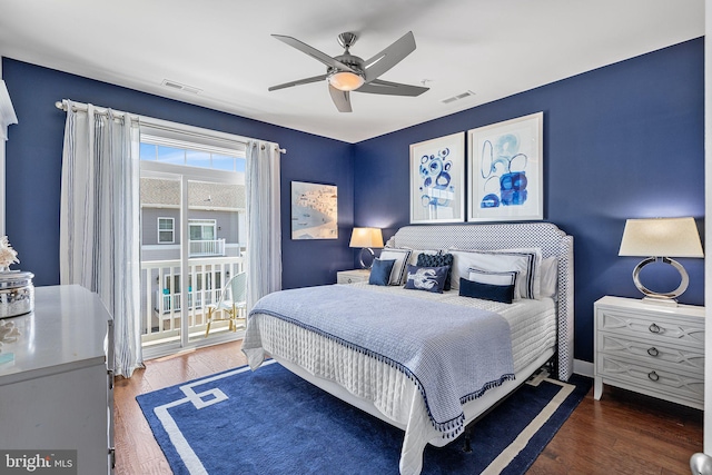 bedroom featuring visible vents, wood finished floors, a ceiling fan, and access to outside