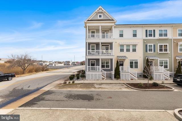 view of property with a balcony