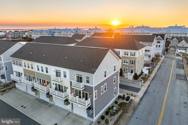 aerial view at dusk with a residential view