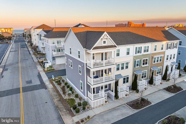 aerial view at dusk with a residential view