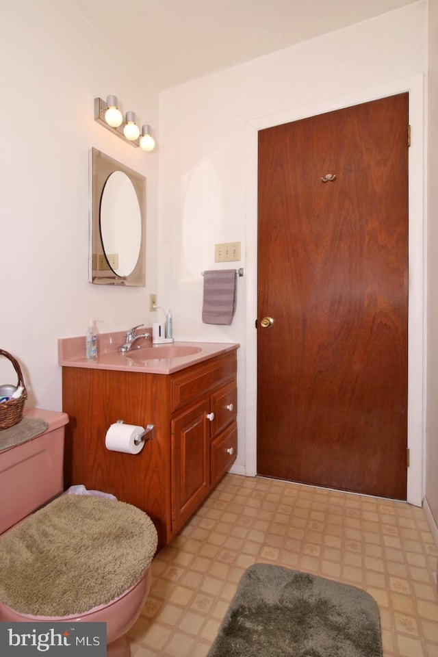 bathroom featuring tile patterned floors and vanity