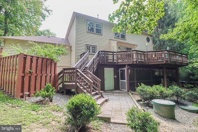 back of house with a patio, a wooden deck, and stairway
