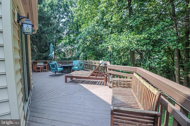 deck with a fire pit