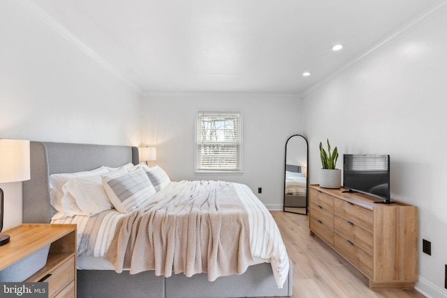 bedroom featuring recessed lighting, light wood-type flooring, baseboards, and ornamental molding