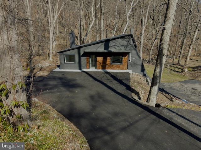 view of front of home with a chimney