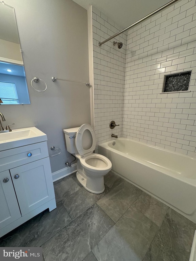 full bathroom featuring baseboards, toilet, vanity, and  shower combination