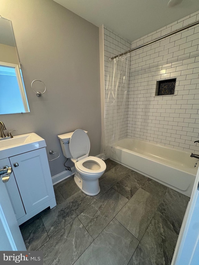 full bathroom with vanity, baseboards, shower / bath combination with curtain, toilet, and marble finish floor