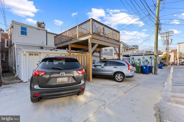 view of parking with a garage