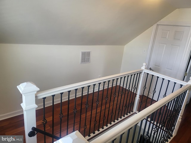 1858 47th St, Pennsauken, NJ 08110 - stairway featuring baseboards, vaulted ceiling, wood finished floors, and visible vents
