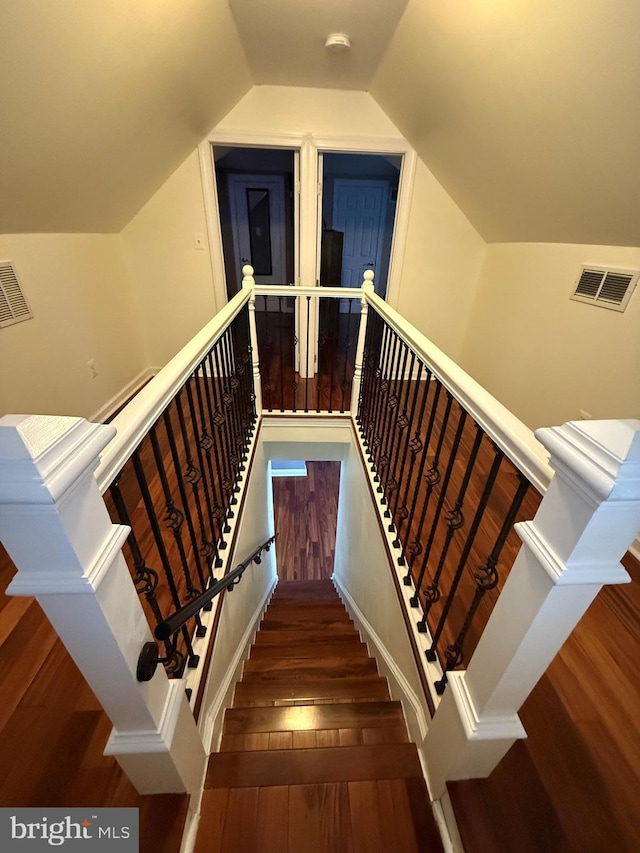 1858 47th St, Pennsauken, NJ 08110 - stairway featuring visible vents, wood finished floors, and vaulted ceiling