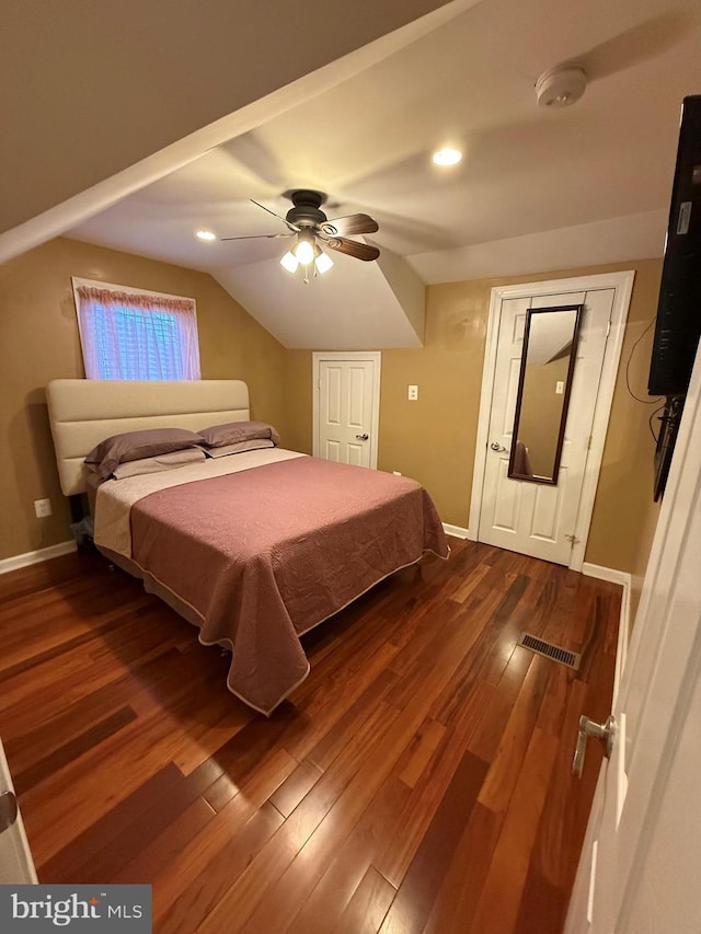 1858 47th St, Pennsauken, NJ 08110 - bedroom with a ceiling fan, visible vents, vaulted ceiling, baseboards, and dark wood-type flooring