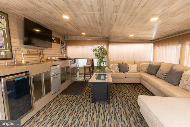1858 47th St, Pennsauken, NJ 08110 - living room with wood walls, recessed lighting, wooden ceiling, wine cooler, and indoor bar