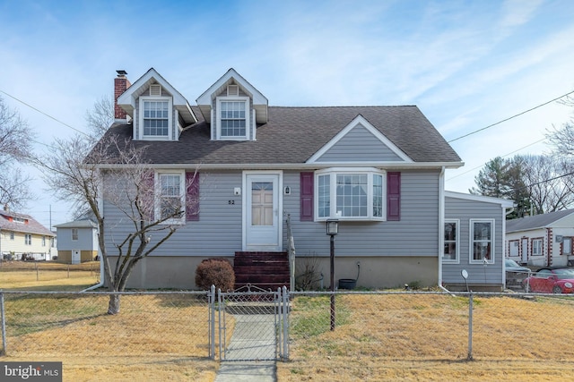 new england style home featuring a gate, a fenced front yard, a front lawn, and entry steps