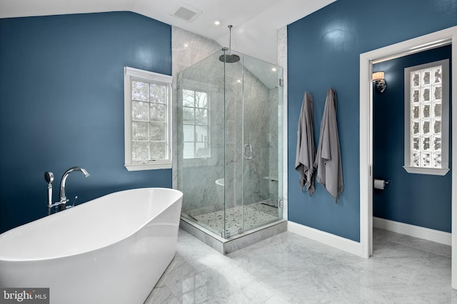 bathroom featuring visible vents, lofted ceiling, marble finish floor, and a stall shower