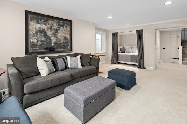 living room with recessed lighting, baseboards, and carpet floors