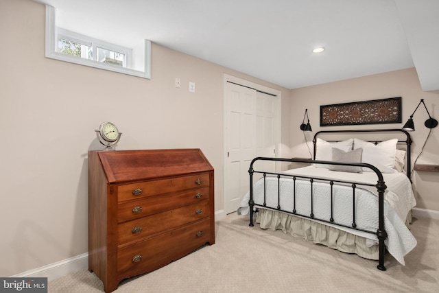 bedroom with recessed lighting, a closet, baseboards, and carpet flooring