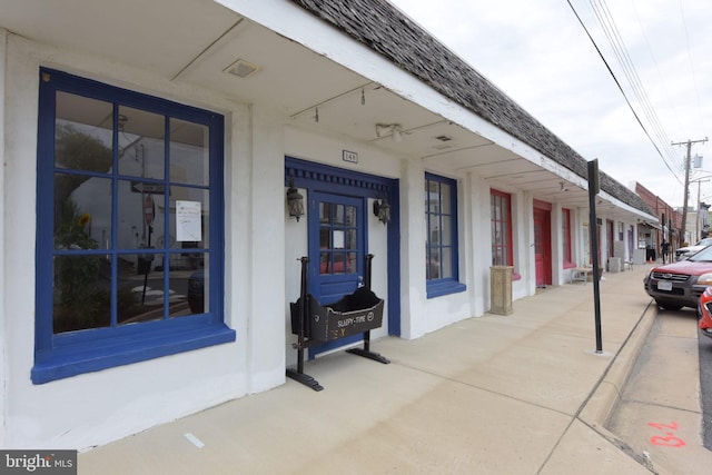 view of exterior entry with visible vents